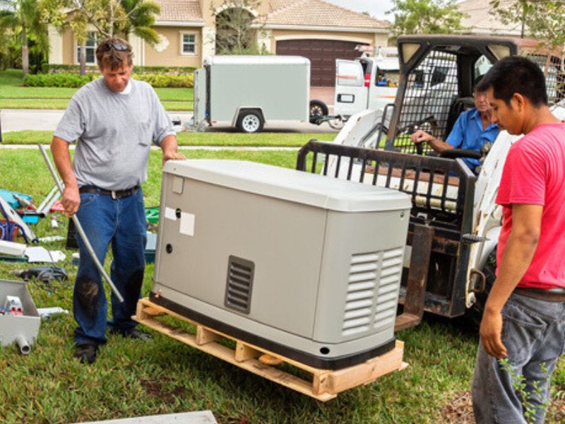 HVAC technicians are moving generator for installation in Goodlettsville, TN Home