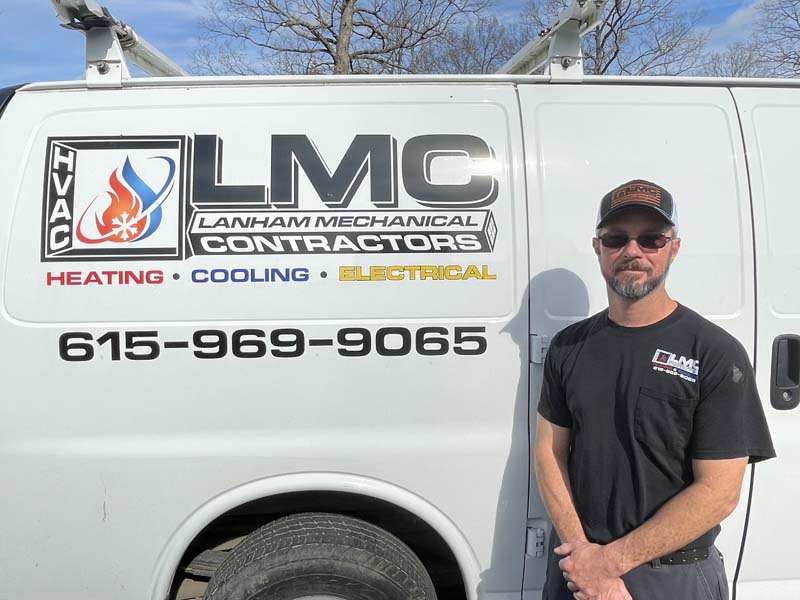 Clint Rose Clint Rose Install _ maintenance technician Team member in front of Lanham's AC Service Company Van