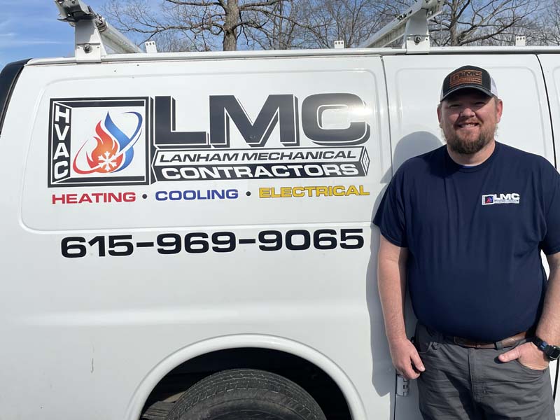 Dennis Acey Dennis Acey HVAC Technician Team member in front of Lanham's AC Service Company Van