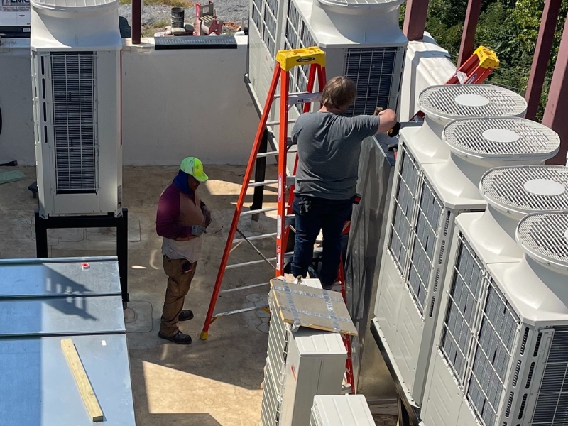 Lanham's AC Service Team is working on commercial HVAC unit in Goodlettsville, TN